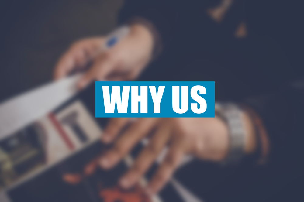 Blurred image of hands flipping through a magazine, overlaid with bold white text on a blue background reading 'WHY US'